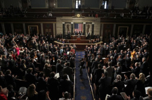 South Korean President Lee Myung-bak joins members of the U.S. Congress in applauding those members who fought in the Korean war during President Lee's address to a joint meeting of U.S. Congress on Capitol Hill in Washington, October 13, 2011. REUTERS/Hyungwon Kang (UNITED STATES - Tags: POLITICS)